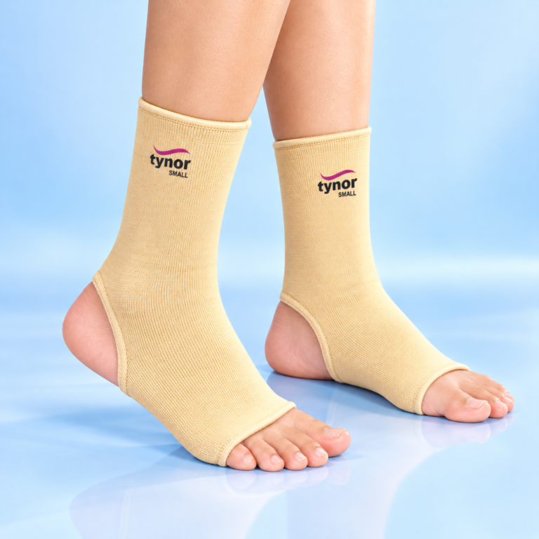 Two beige Tynor Anklet D03 ankle supports supplied as a pair