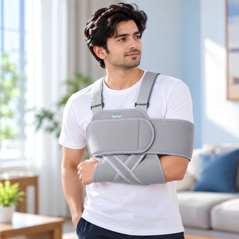 Man wearing the Tynor Universal Shoulder Immobilizer C02